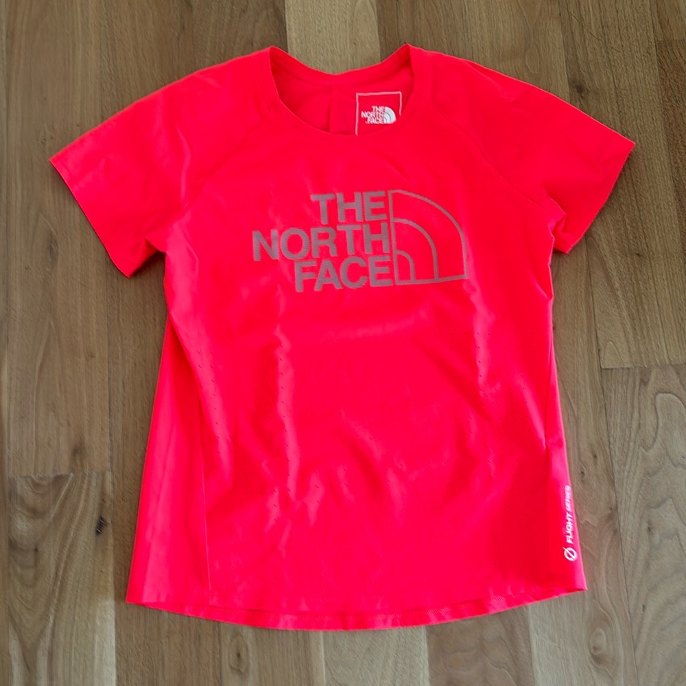 Extremely neon orange workout top